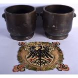 A PAIR OF JAPANESE MEIJI PERIOD MIXED METAL PLANTERS and a German military badge. Largest 22 cm wide