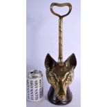 A VICTORIAN BRONZE FOX HEAD DOOR STOP. 37 cm high.