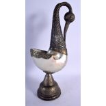 AN UNUSUAL LARGE 19TH CENTURY INDIAN WHITE METAL AND SHELL FIGURE modelled as a swan. 32 cm high.