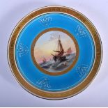 20TH C. MINTON PLATE PAINTED WITH A SAILING SCENE UNDER A TURQUOISE BORDER UNDOUBTEDLY BY J E DEAN.