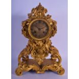 A LOVELY 19TH CENTURY FRENCH ORMOLU MANTEL CLOCK overlaid with scrolling acanthus and hanging berrie