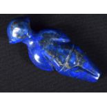 A carved Lapis Lazuli boulder in the shape of a person. 8cm