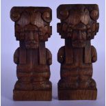 A PAIR OF 18TH CENTURY NORTHERN EUROPEAN CARVED TREEN WOOD PLAQUES depicting bearded males. 16 cm x