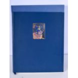 A book by Neil Barnett " The Spirit of Chelsea Football Club" with a mounted silver plaque.35 x 31 c