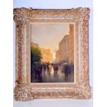 A framed oil on canvas signed indistinctly depicting a street scene 38 x 28 cm.