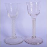 TWO 18TH CENTURY WINE GLASSES with spiral twist stems. 14.5 cm high. (2)