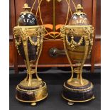 A RARE PAIR OF FRENCH ANTIQUE ORMOLU AND STONE VASES AND COVERS. 30 cm high.