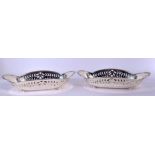 A PAIR OF TIFFANY & CO SILVER BON BON DISHES. 259 grams. 20 cm x 11.5 cm.