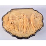 AN ANTIQUE CLAM SHELL SHAPED IVORY BOX AND COVER CARVED WITH CLASICAL FIGURES WITH SILVER MOUNTS.