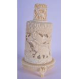 AN EARLY 20TH CENTURY AFRICAN CARVED IVORY TUSK VASE AND COVER decorated with animals. 21 cm x 9 cm.