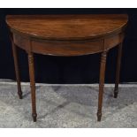 An antique wooden circular top card table 74 x 96 x 42 cm.