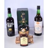 A bottle of Courvoisier Champagne Brandy, together with bottles of Sherry, Port and Whiskey