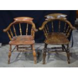 A pair of Victorian Oak and Elm smokers chairs 86 x 48 x 66cm (2).