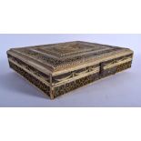 A LATE 18TH/19TH CENTURY RUSSIAN CARVED IVORY RECTANGULAR BOX carved with bold foliage and vines. 27