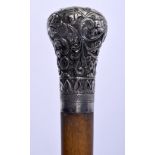 A FINE 19TH CENTURY FULL LENGTH SOUTH EAST ASIAN RHINOCEROS HORN CANE with repousse silver mounts. 8