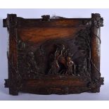 A 19TH CENTURY BAVARIAN BLACK FOREST CARVED WOOD PLAQUE depicting a rearing horse. 38 cm x 34 cm.