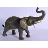 A CONTEMPORARY COLD PAINTED BRONZE ELEPHANT. 30 cm x 20 cm.