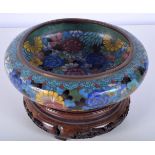 A 19th Century Chinese Cloisonne bowl decorated with flowers together with a hardwood stand.4.5 cm (