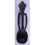 AN AFRICAN TRIBAL CARVED WOOD SPOON in the form of a monkey. 18 cm long.