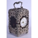 A LATE VICTORIAN SILVER AND TORTOISESHELL TRAVELLING CLOCK. 289 grams. 10.75 cm x 5 cm.