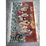 A small Chinese rug 143 x 92 cm.