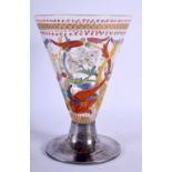 AN EARLY EUROPEAN ENAMELLED GLASS CUP decorated with scrolls and birds. 14 cm high.