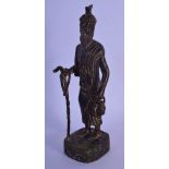 AN 18TH/19TH CENTURY MIDDLE EASTERN BRONZE FIGURE OF A MALE modelled holding a teapot and staff. 24