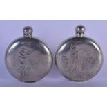 A RARE PAIR OF VINTAGE SILVER PLATED HUNTING HIP FLASKS depicting a hunter and golfer. 12 cm x 9 cm.