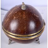 An antique hinged lid coconut box with plated scrolling mounts 13 cm high .