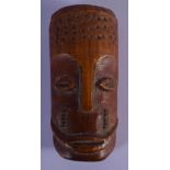 AN EARLY 20TH CENTURY AFRICAN CARVED TRIBAL MASK with sparse decoration. 12 cm x 5 cm.