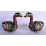 AN EARLY 20TH CENTURY CHINESE CLOISONNE ENAMEL BOXES AND COVERS in the form of ducks. 17 cm x 14 cm.