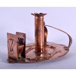 AN ARTS AND CRAFTS COPPER CHAMBERSTICK overlaid with fish. 18 cm x 14 cm.