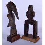 TWO AFRICAN TRIBAL HEDLEY WOOD PULLYS. 25 cm high. (2)