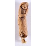 AN 18TH CENTURY JAPANESE EDO PERIOD CARVED STAG ANTLER NETSUKE modelled as a Dutchman. 7 cm high.