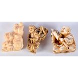 THREE 19TH CENTURY JAPANESE MEIJI PERIOD CARVED IVORY NETSUKES in various forms. 4.5 cm x 3 cm. (3)