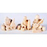 THREE 19TH CENTURY JAPANESE MEIJI PERIOD CARVED IVORY OKIMONO modelled with various instruments. 7 c