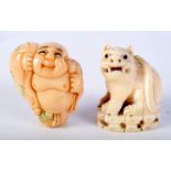 A 19TH CENTURY CHINESE CARVED IVORY FIGURE OF A BEAST together with a carved tag nut netsuke. Larges