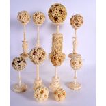 A SET OF EIGHT 19TH CENTURY CHINESE CANTON IVORY PUZZLE BALL STANDS together with ten puzzle balls.