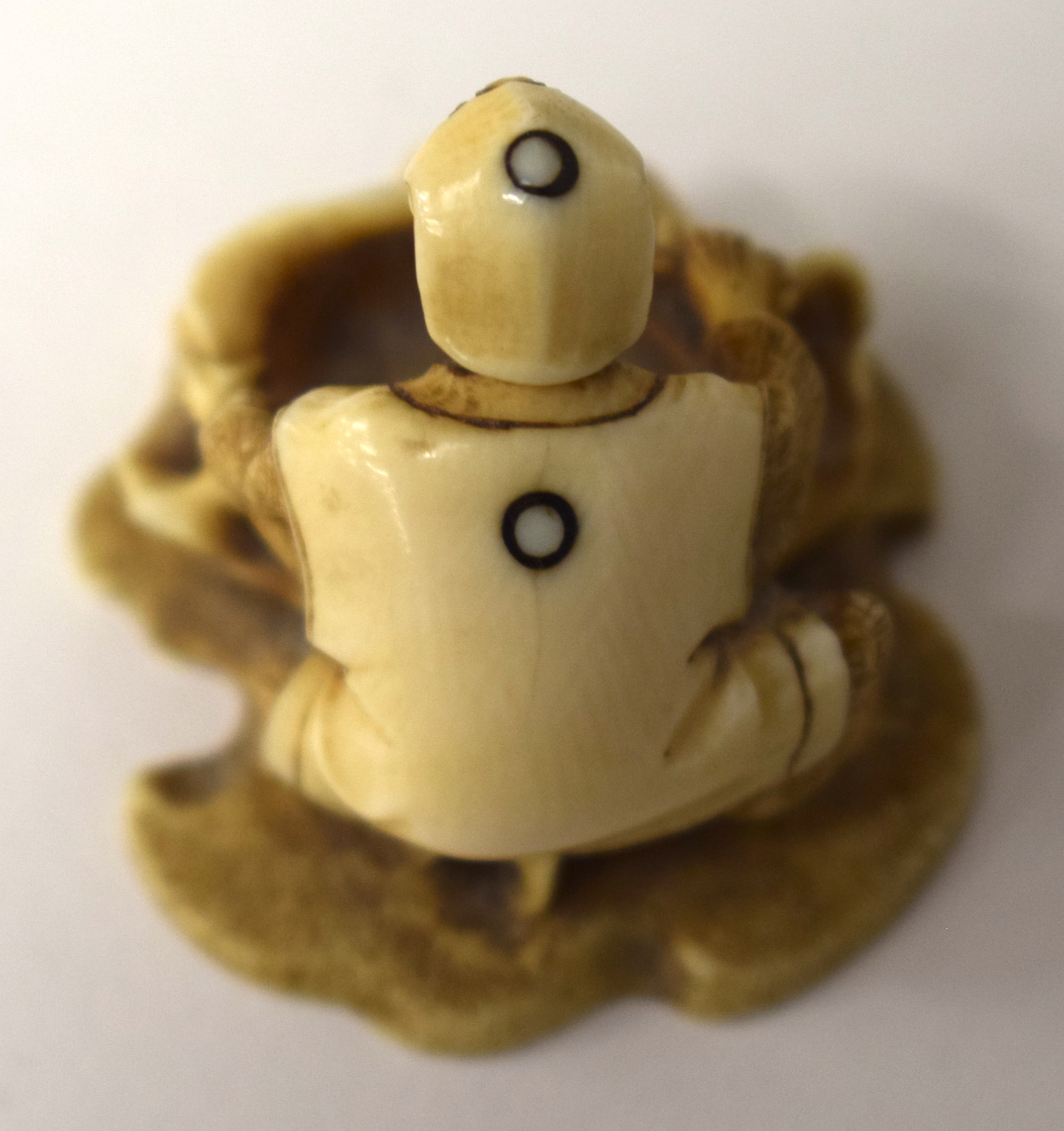 A 19TH CENTURY JAPANESE MEIJI PERIOD CARVED IVORY NETSUKE modelled as a male holding a sack. 3 cm x - Image 8 of 13