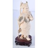 A 19TH CENTURY CHINESE CARVED IVORY FIGURE OF A WARRIOR modelled holding a spear. 19 cm high overall