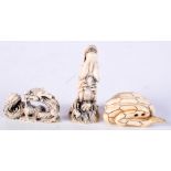 TWO EARLY 20TH CENTURY JAPANESE MEIJI PERIOD CARVED IVORY NETSUKE together with another snake netsuk