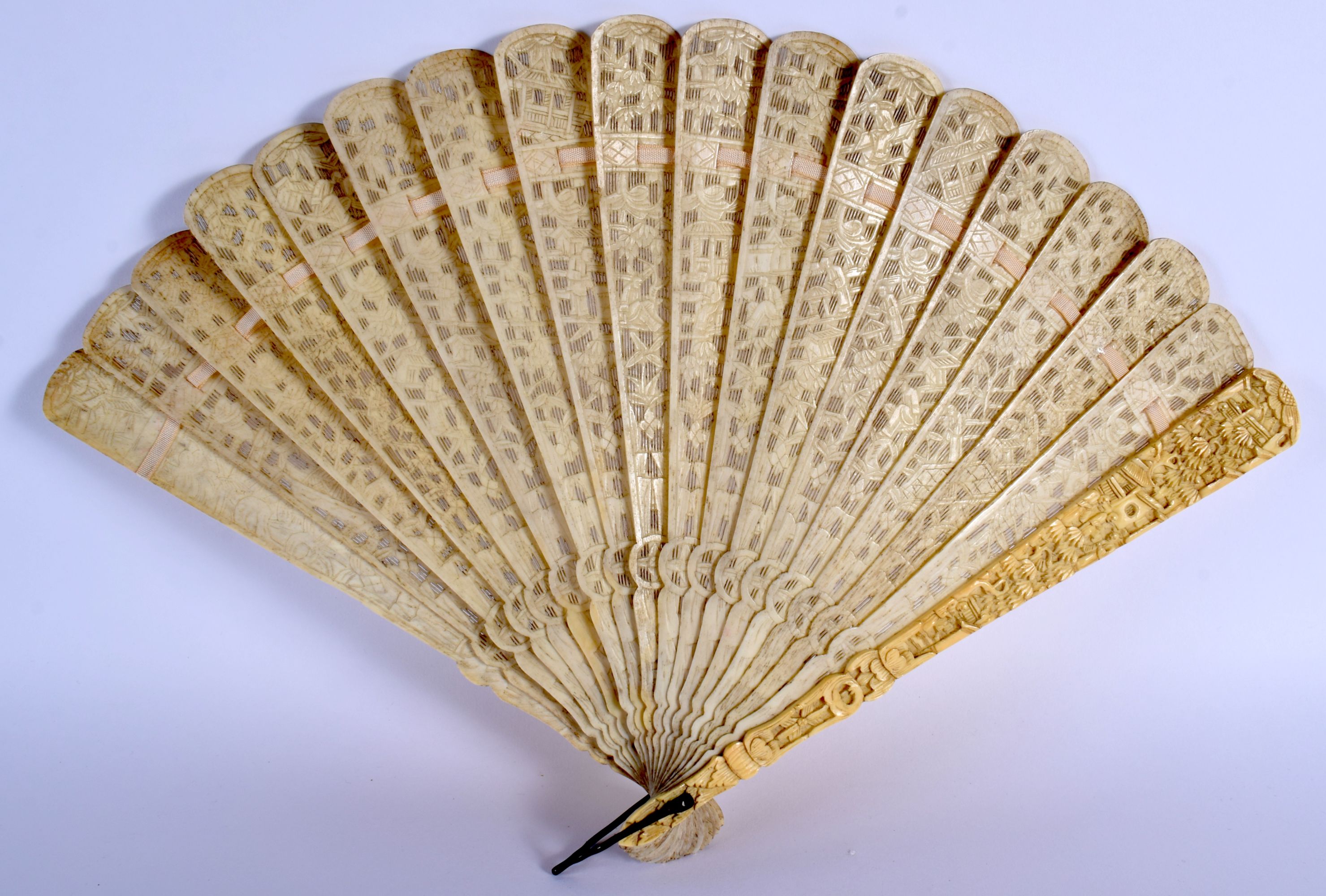 A MID 19TH CENTURY CHINESE CARVED IVORY BRISE FAN C1850 decorated with figures. 36 cm wide extended.