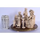 A LARGE AND RARE 19TH CENTURY EUROPEAN DIEPPE IVORY FIGURE modelled as figures having a tea party, u