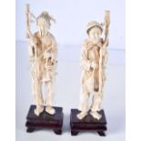 A PAIR OF EARLY 20TH CENTURY CHINESE CARVED IVORY FISHERMAN Late Qing. 22 cm high.