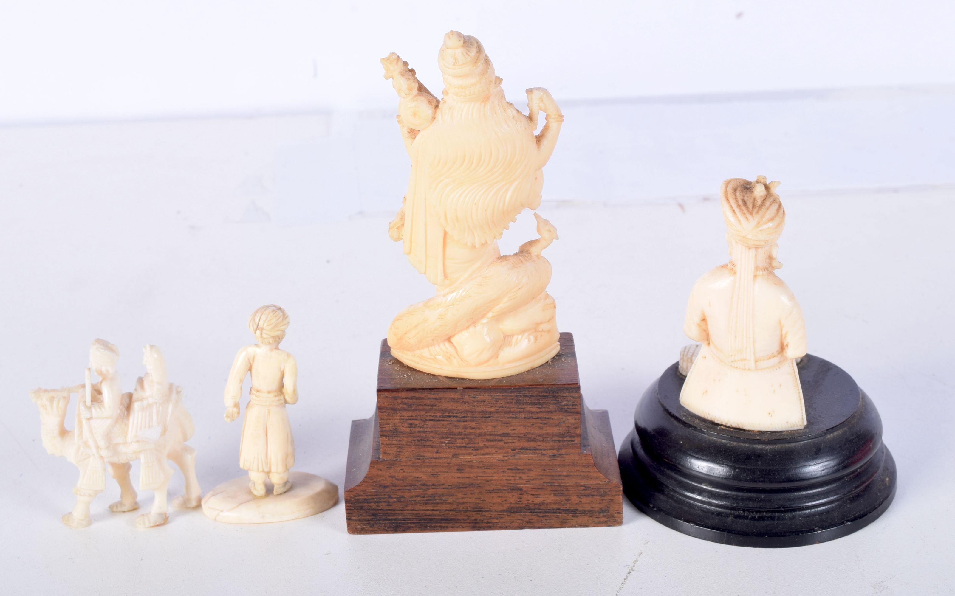 A 19TH CENTURY ANGLO INDIAN CARVED IVORY FIGURE OF A SNAKE CHARMER together with a musician and anot - Image 3 of 5