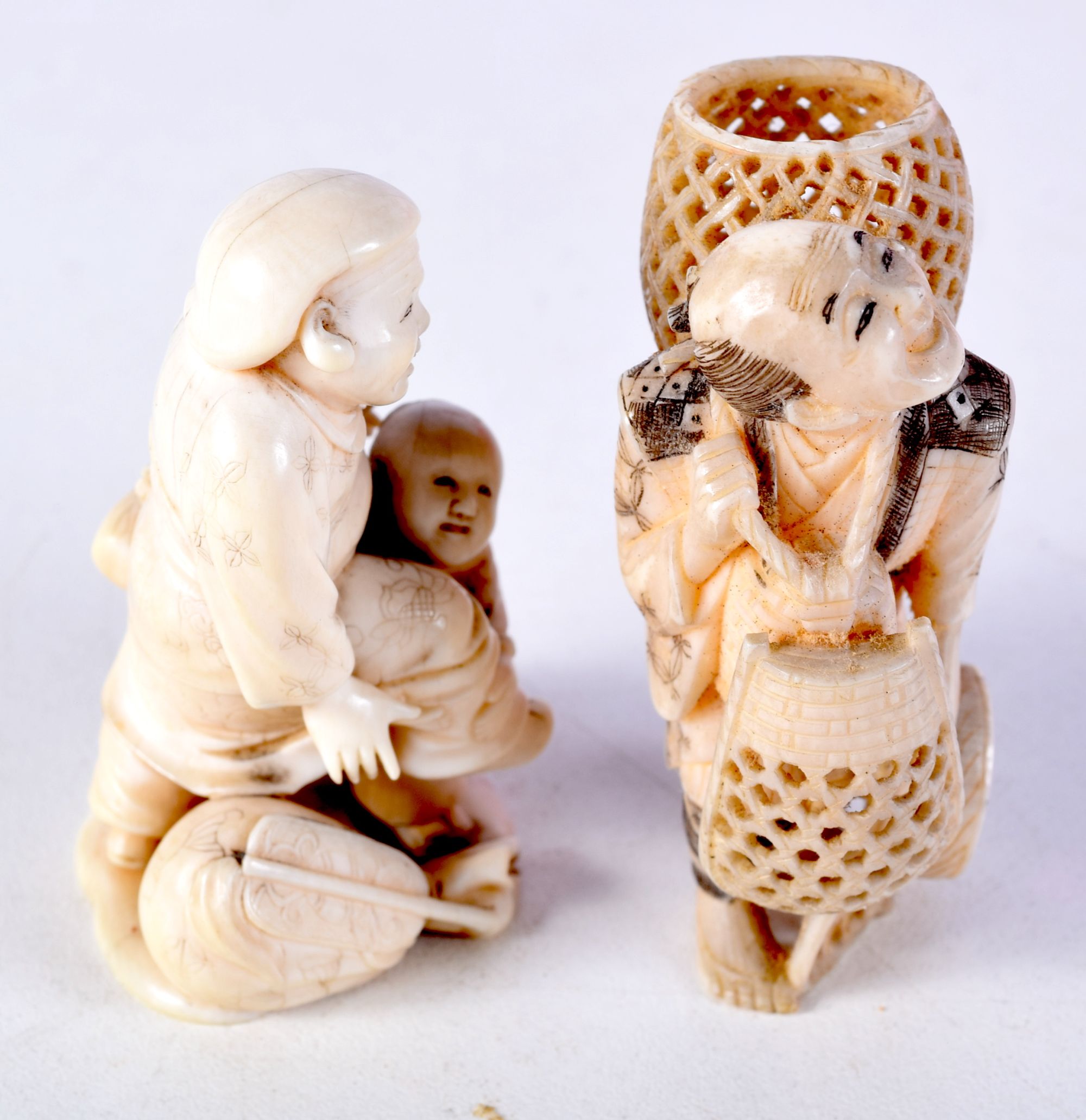 TWO 19TH CENTURY JAPANESE MEIJI PERIOD CARVED IVORY OKIMONO one modelled as a basket seller. Largest - Image 4 of 5