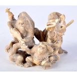 A 19TH CENTURY JAPANESE MEIJI PERIOD CARVED IVORY OKIMONO modelled as numerous monkeys. 7 cm x 5 cm.