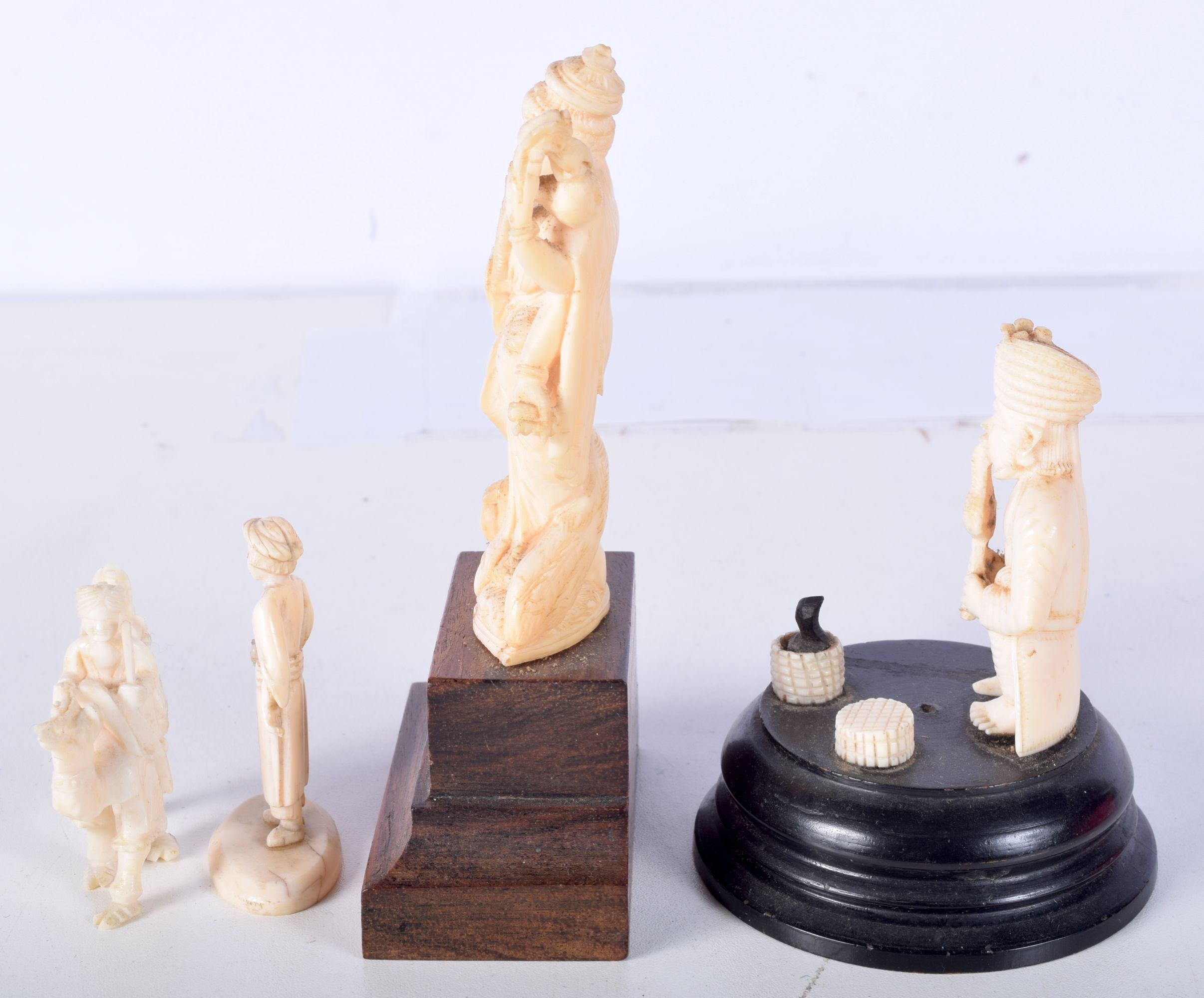 A 19TH CENTURY ANGLO INDIAN CARVED IVORY FIGURE OF A SNAKE CHARMER together with a musician and anot - Image 2 of 5