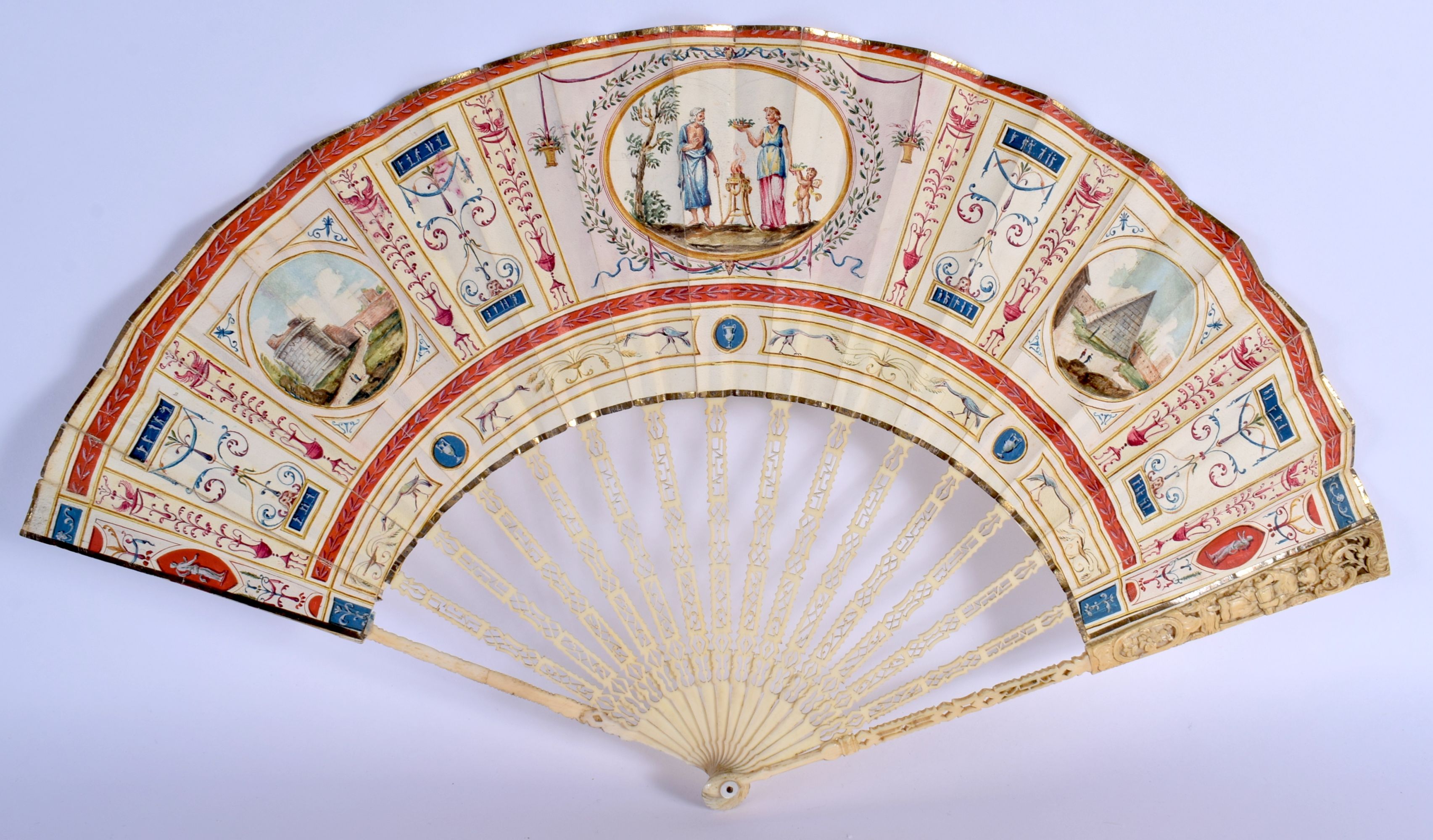 A FINE LATE 18TH CENTURY EUROPEAN GRAND TOUR TYPE FAN with paper leaf supports. 50 cm wide extended.