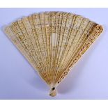 A MID 19TH CENTURY CHINESE CANTON IVORY FAN decorated with figures. 27 cm wide extended.